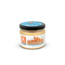 Smooth cashew butter in a jar, made from roasted cashews, ideal for healthy spreads or recipes.