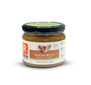 Rich and creamy pistachio butter in a jar, made from finely ground roasted pistachios—perfect for gourmet spreads or baking.